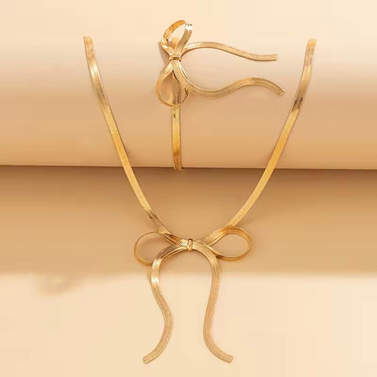 Side Bow Herringbone Necklace