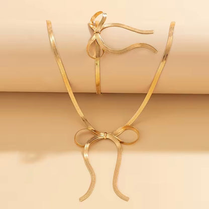 Side Bow Herringbone Necklace