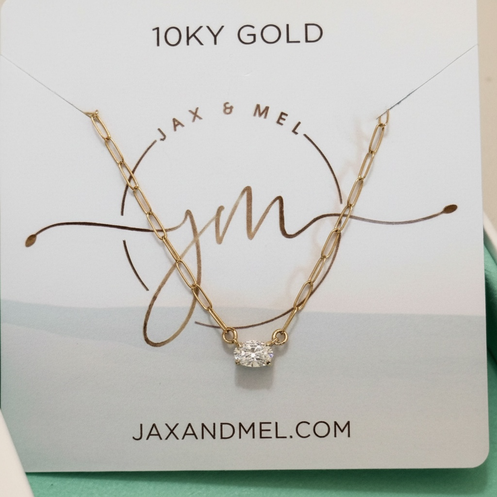 Oval 10KY Gold Cubic Zirconia Floating Diamond