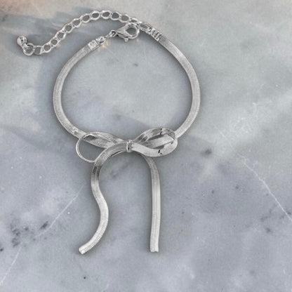 Side Bow Herringbone Necklace